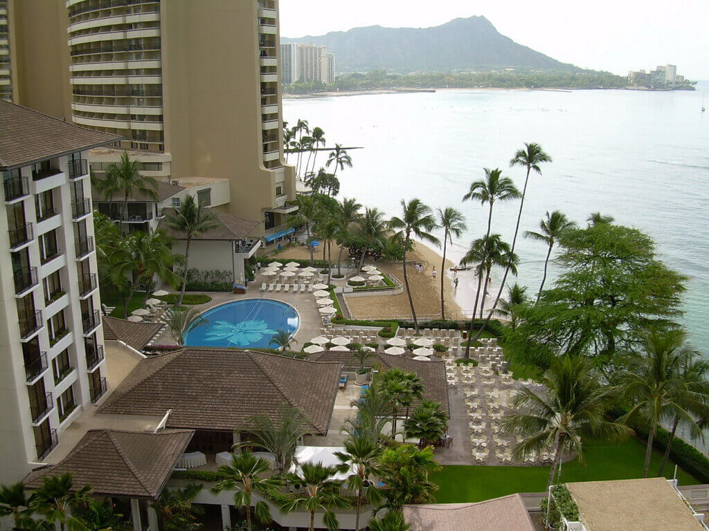 View of pool area from a balcony of the Halekulani Hotel in Honolulu, Hawaii.